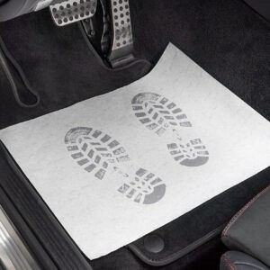 Zaščita za tepihe iz papirja z tiskom stopal